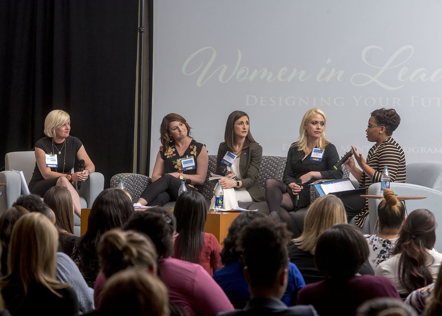 A panel of prominent community leaders speaking during the 2018 Women in Leadership Conference