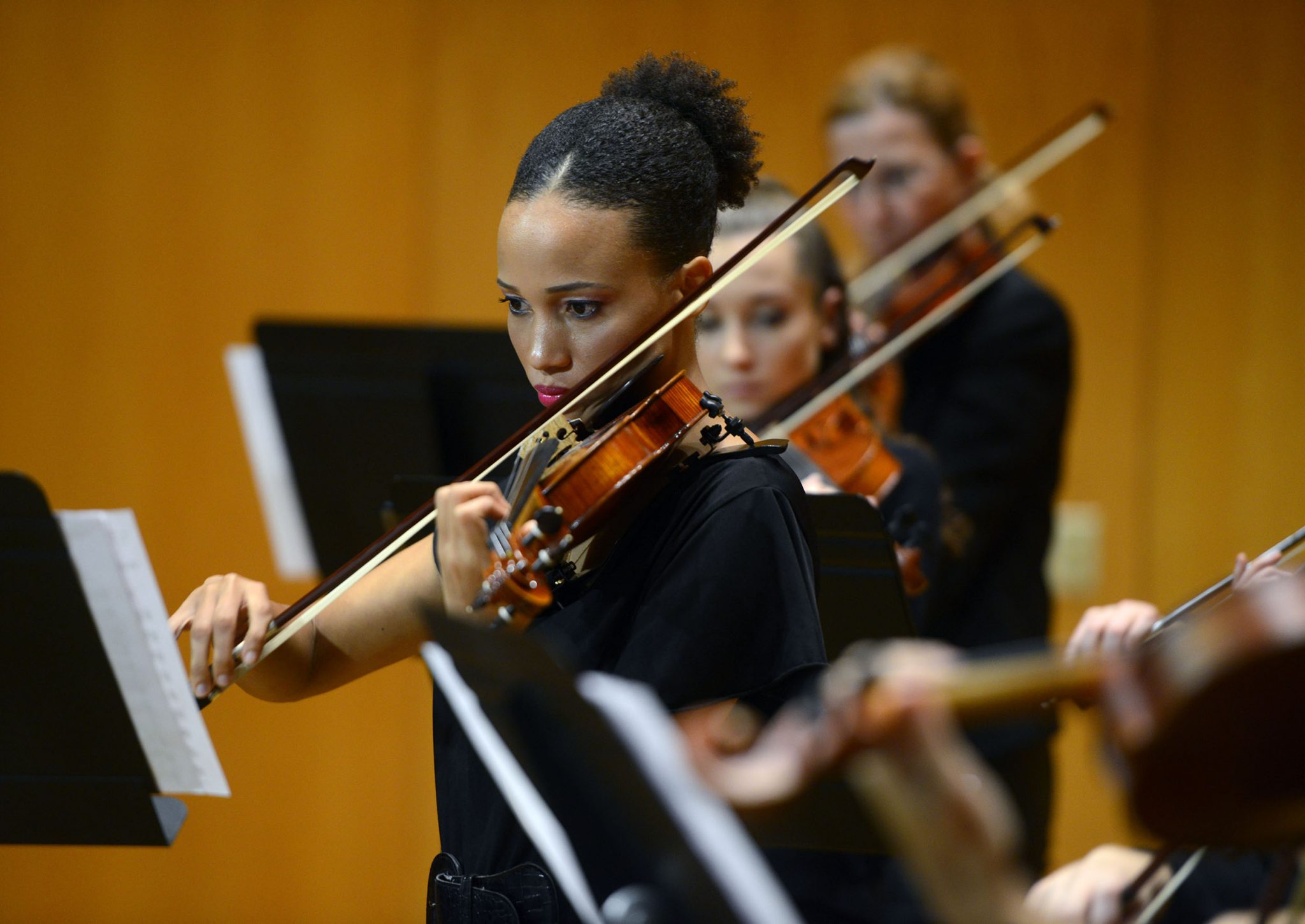 Members of the The Runge Strings Ensemble rehearse in the Music Hall at the University of West Florida.