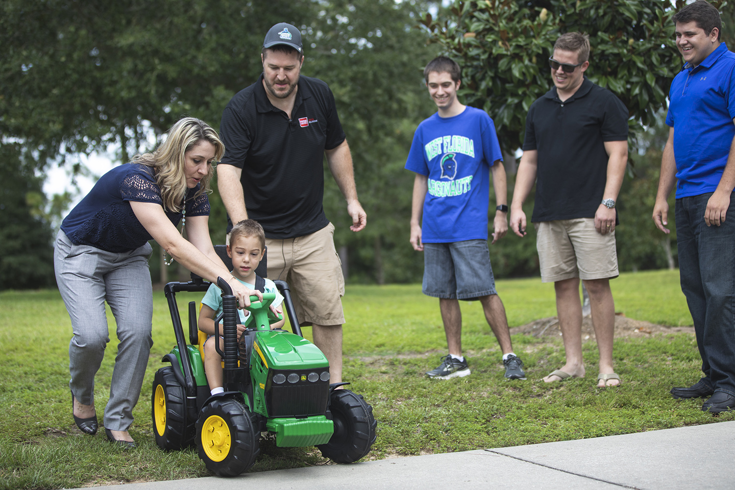 Four-year-old Jack Carroll receives the first modified vehicle from UWF’s ArgoTots program