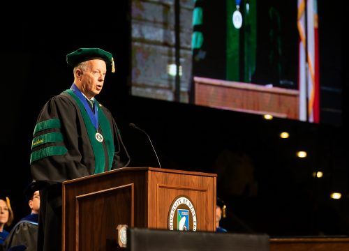 Mort O'Sullivan gives a commencement speech to the UWF Fall 2019 graduating class at the Pensacola Bay Center on Dec. 14, 2019.
