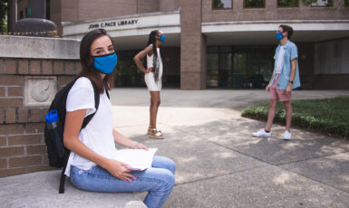 UWF students venture about campus while wearing face protection on Aug. 19, 2020.