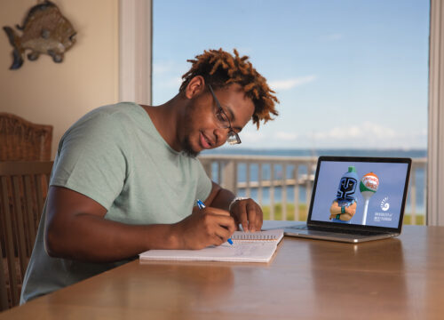 A UWF student takes advantage of online education by taking classes online at a beach house on Pensacola Beach on June 5, 2020.