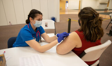 UWF nursing students aid local Florida Deptartment of Health officials by administering COVID-19 vaccinations at a vaccination facility in Milton, Florida, on Mar. 17, 2021.