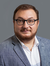 Dr. Salih Kocak indoor headshot.