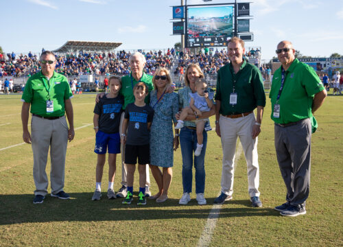 Sandy Sansing and family at a UWF football game