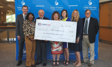 Members First Credit Union of Florida donated a gift of $140,000 to the UWF Foundation at the College of Business on May 10, 2022.