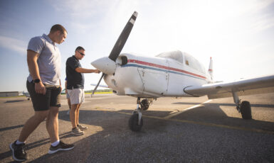 The UWF College of Business partnered with AMS Flight School in Milton to host an eight-week flight training program for ten students beginning on May 28, 2022.
