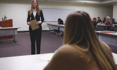 Audrey Foss, a member of the Pensacola High School Mock Trial team, presents at the tournament.