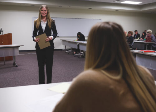 Audrey Foss, a member of the Pensacola High School Mock Trial team, presents at the tournament.