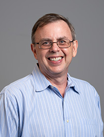 Jerre Brisky indoor headshot.