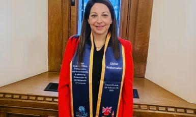 Dr. Eman El-Sheikh smiles with a stole around her neck