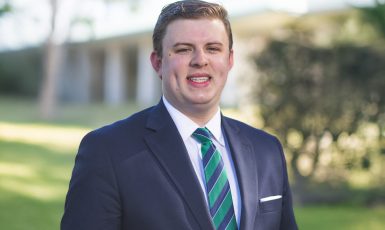 Professional headshot of Alex Smith, new Executive Director of External affairs for UWF