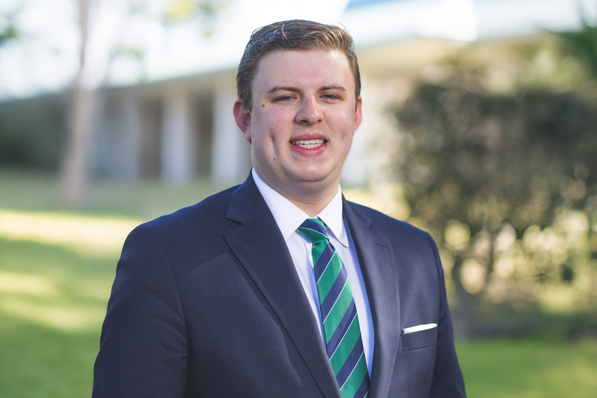 Professional headshot of Alex Smith, new Executive Director of External affairs for UWF