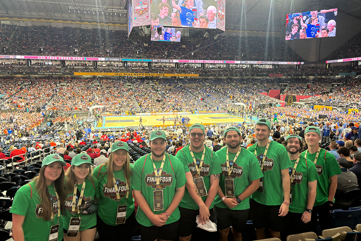 Nine UWF sport management students attend the NCAA Final Four men's basketball tournament inside the packed Alamodome