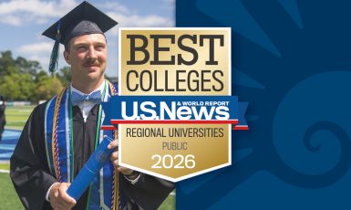 Photo (left): Student in graduation cap and gown holding a diploma. Graphic (right): blue nautilus shell. Badge (center) with text: Best Colleges U.S. News & World Report Regional Universities Public 2026