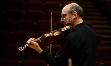 Person plays a violin