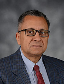 Dr. Ezzat Bakhoum indoor headshot.