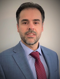 Dr. Mahd Alzoubi indoor headshot.