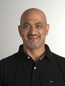 Dr. Tony Al-Abed indoor headshot.