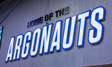 Gymnasium wall with large letters that read, "Home of the Argonauts."