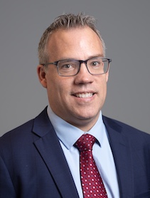 Dr. Ryan Dastrup indoor headshot.